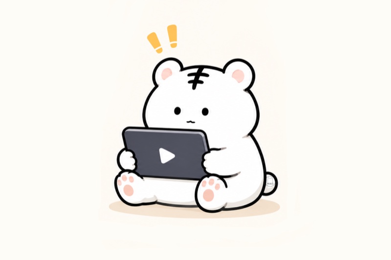 タブレットで動画を見て驚いているまおねこ